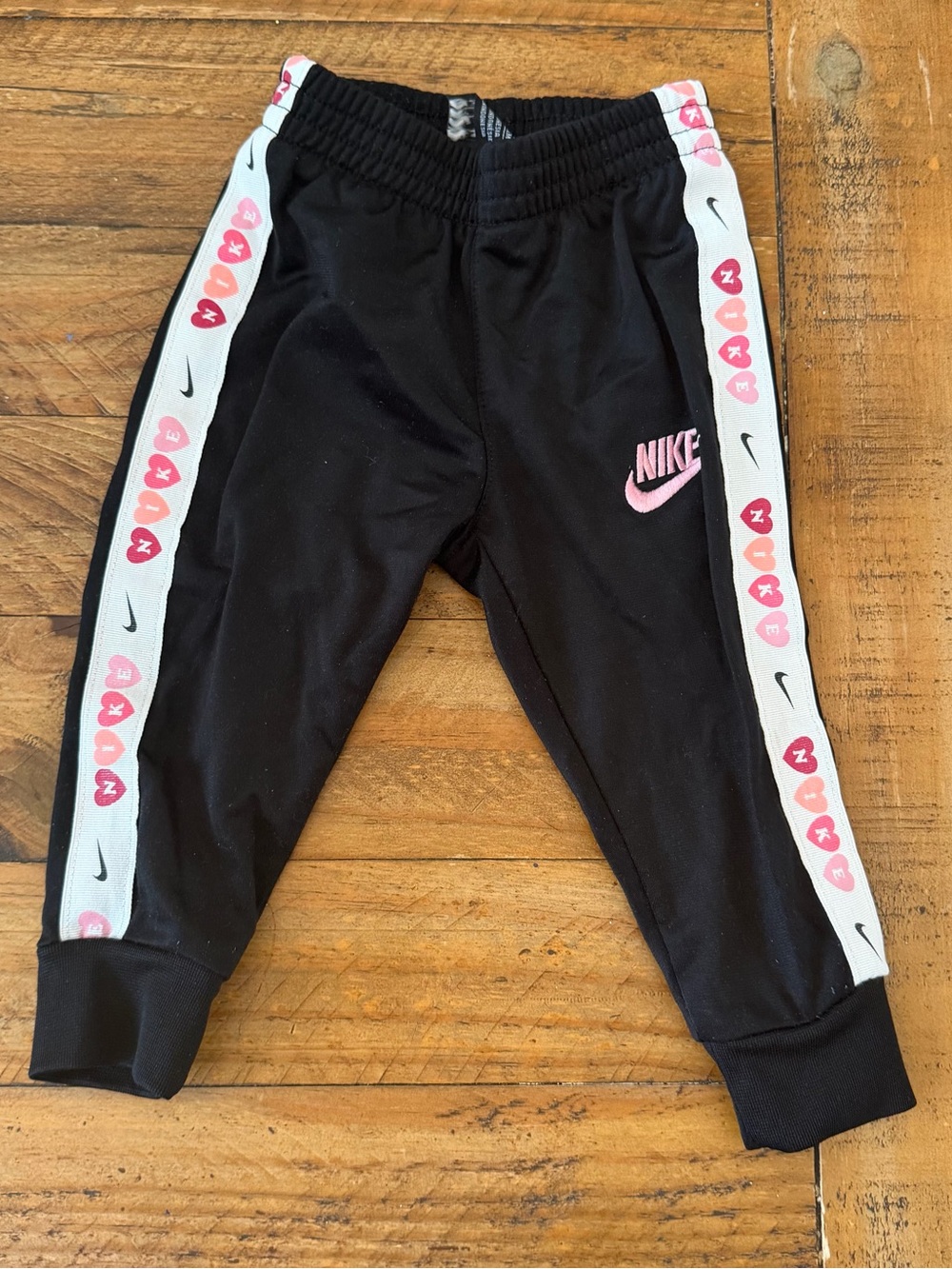 Nike Black Joggers with Pink Logo and Side Heart Trim